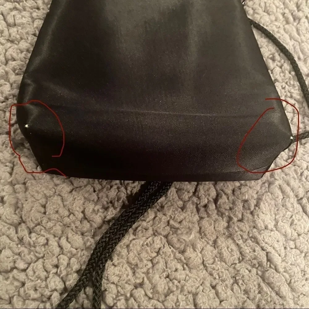 Black Elegant Bag With A Little Beading Hanging In Front